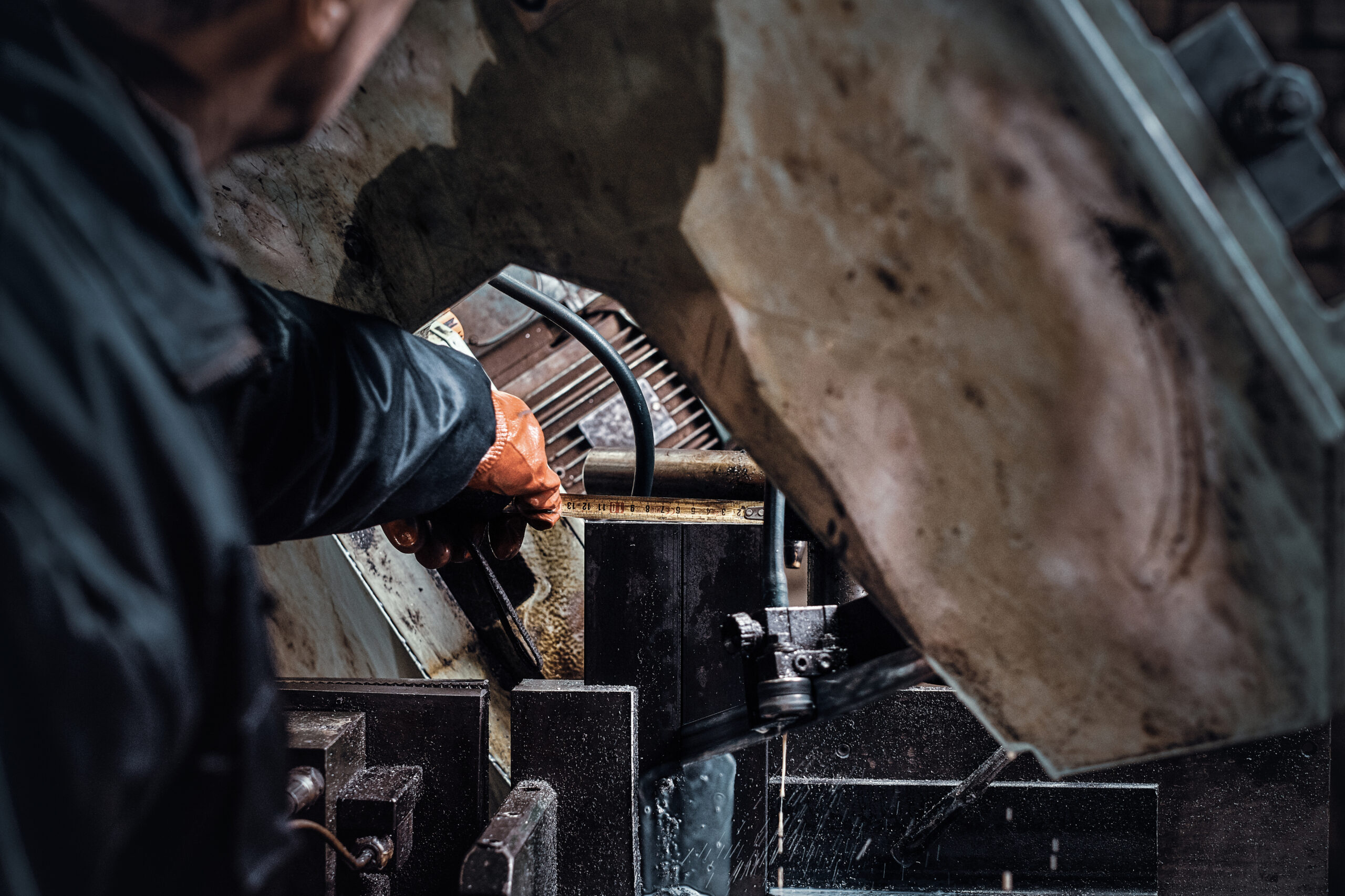 experienced worker is working metal factory